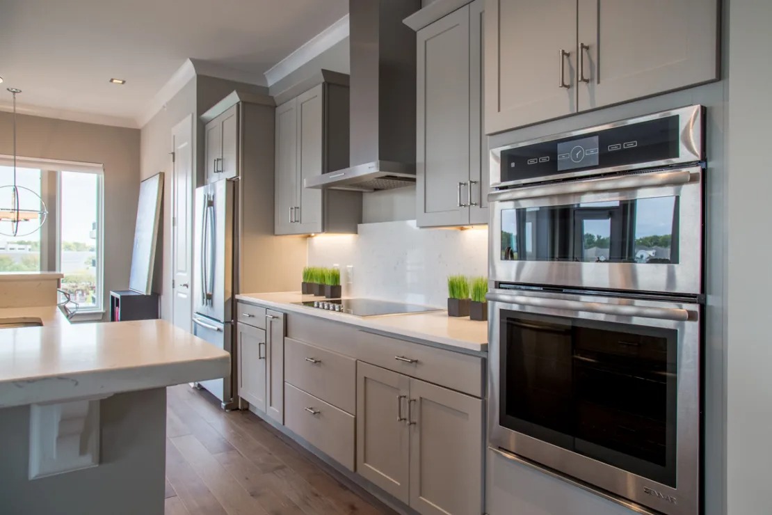 Plank Flooring in Kitchen and Living Areas 