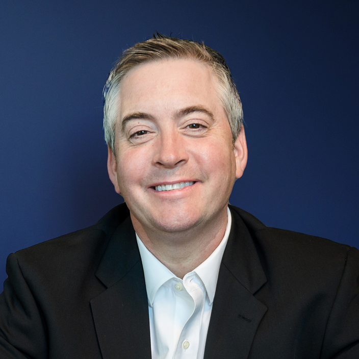 Justin R. Ginetz headshot.