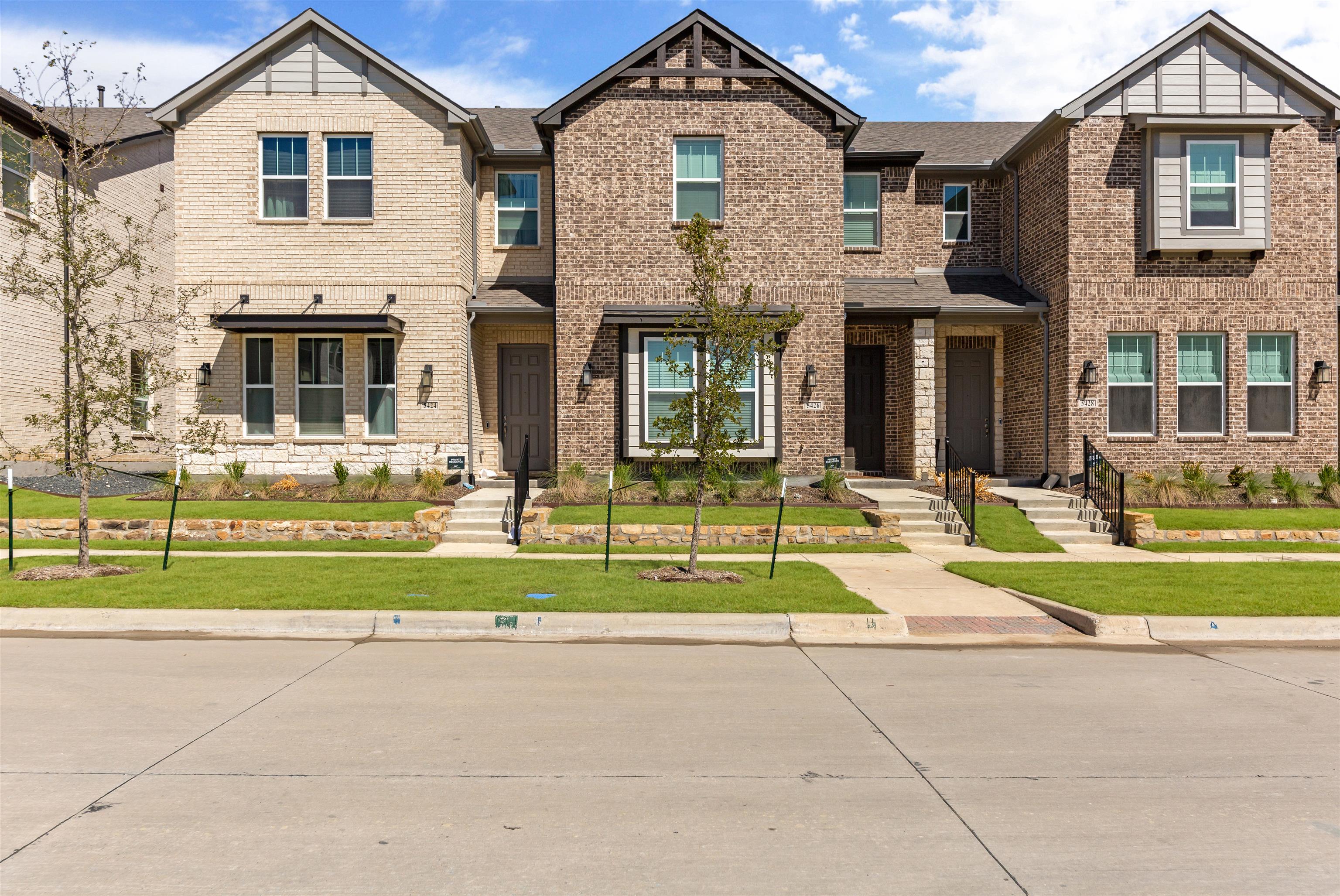 The  Station Townhomes by Ashton Woods in Sachse TX