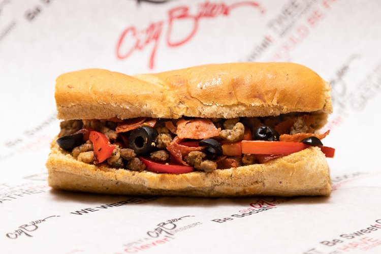 Grilled beef & sausage crumbles, pepperoni, green peppers, melted provolone, black olives, salt & pepper, choice of dressing.
