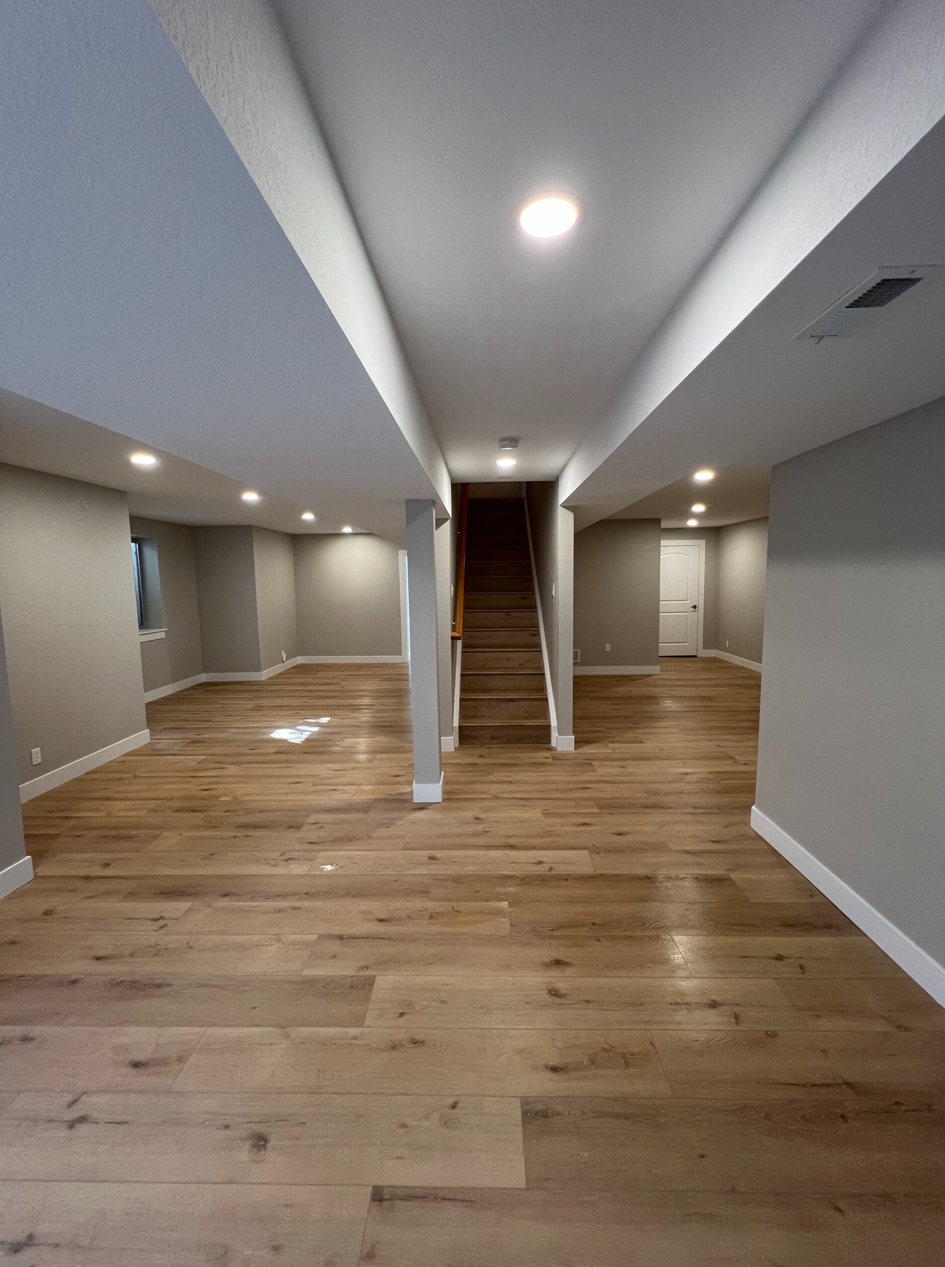 Basement remodel with luxury flooring by Marcotte Remodeling — Boulder, Colorado