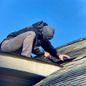 Repairing an asphalt shingle roof in Langdon Walk neighborhood in Smyrna
