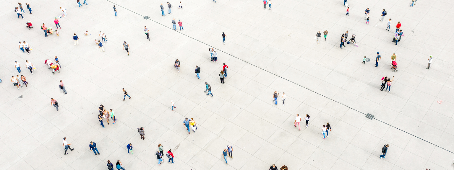 Aerial view of people in a city square.
