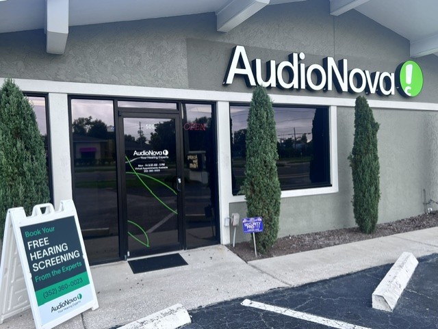 exterior photo of the entryway for AudioNova hearing clinic in Tavares, FL