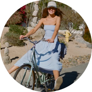 Woman wearing blue Aerie maxi dress.