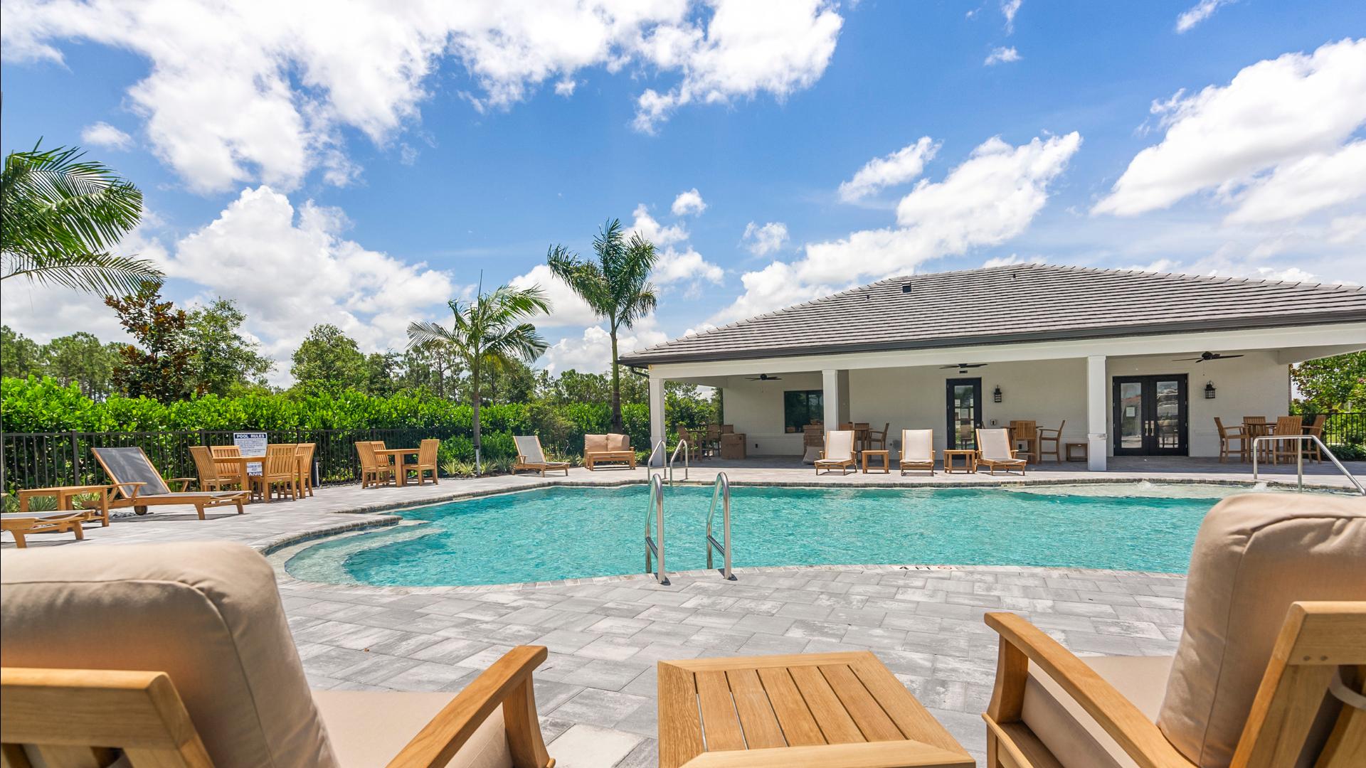 Private amenities include a fitness center, clubhouse, and sparkling pool 