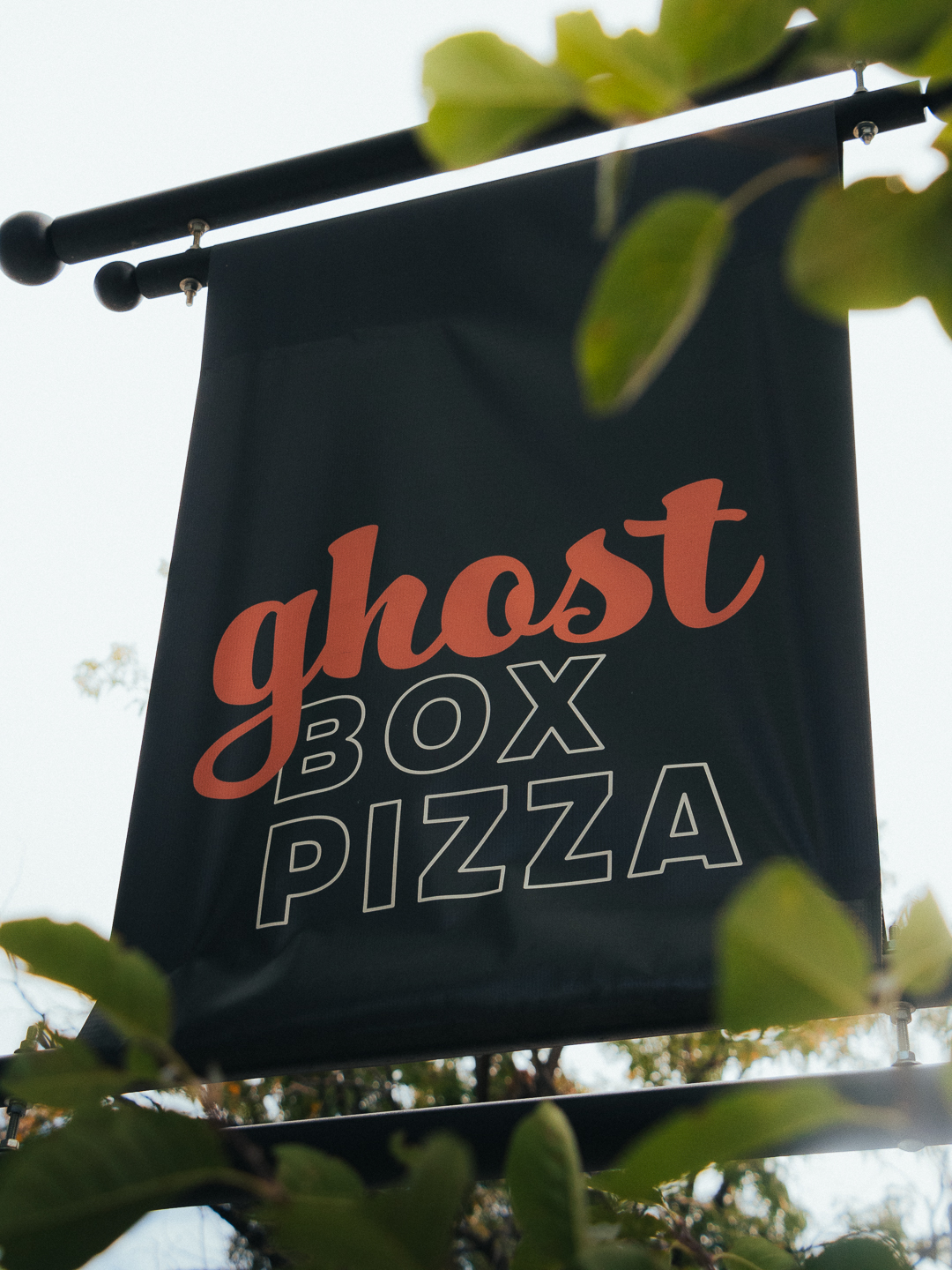 The Ghost Box Pizza storefront showcases one of Lafayette's favorite destinations for Detroit-style pizza and craft beverages.