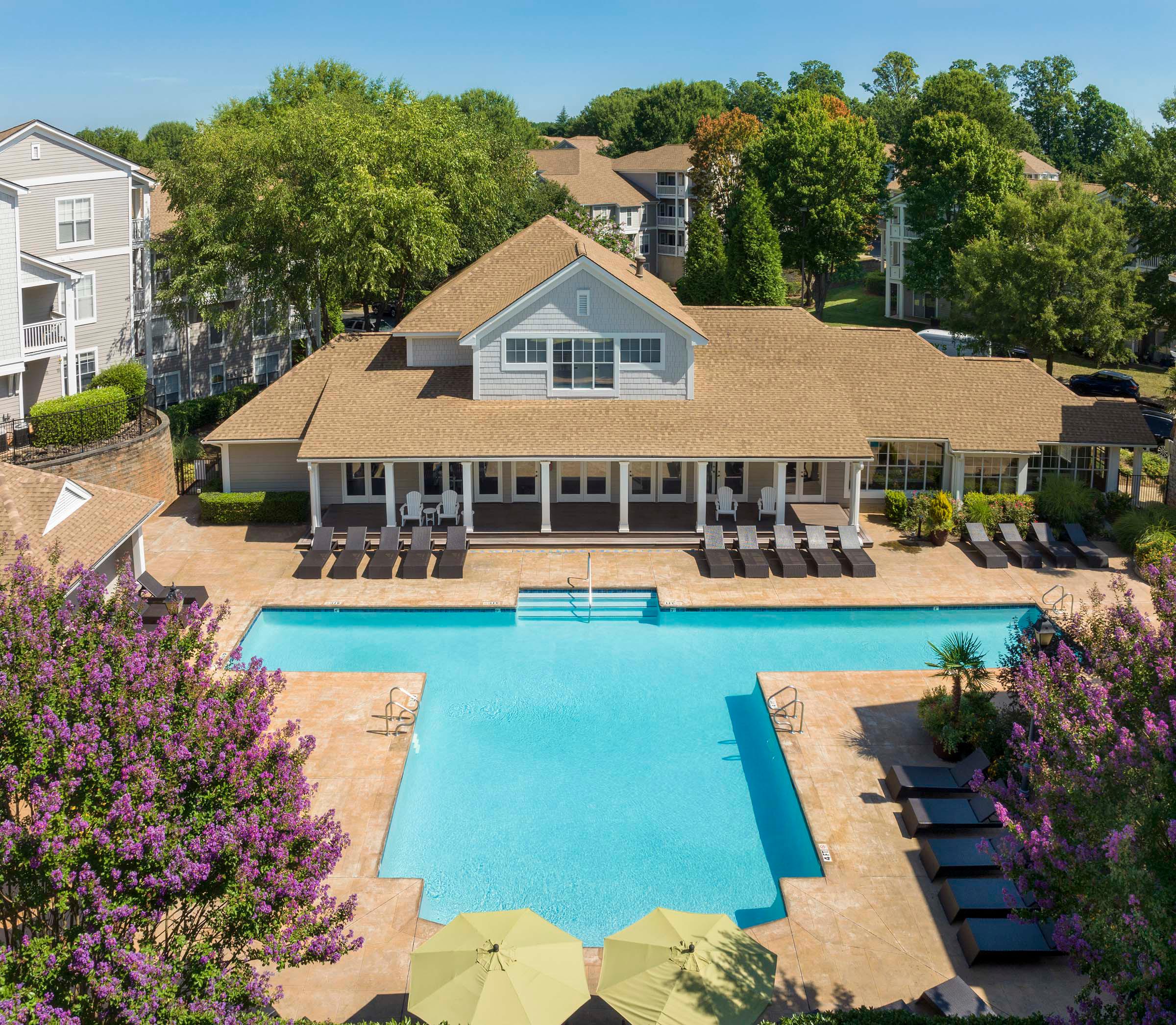 Resort style swimming pool next to resident lounge