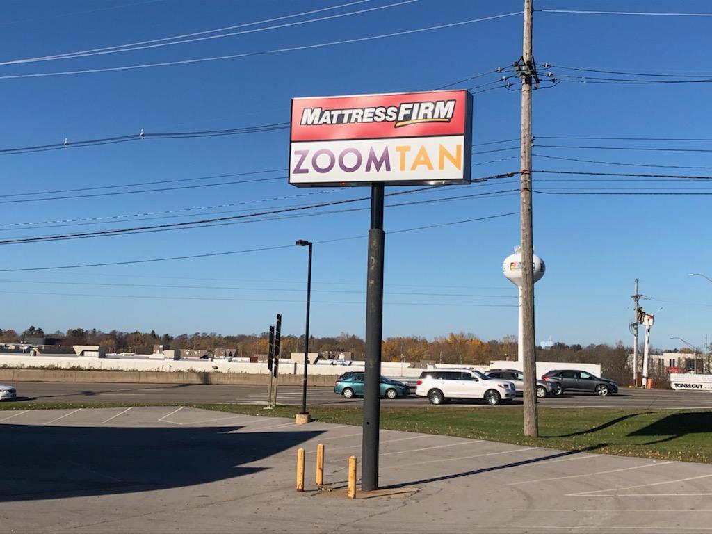 Zoom Tan sign on Peach Street in Erie, PA