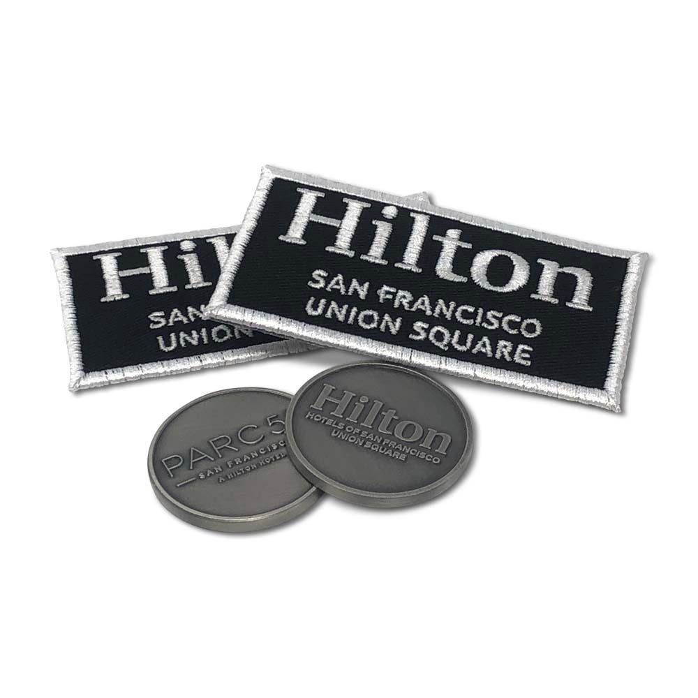 Patches and coins for Hilton San Francisco Union Square. Branded merch by PLC Print.