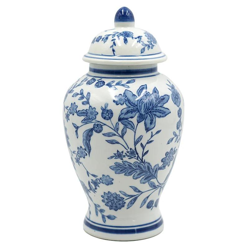 A charming blue and white floral porcelain jar from the Providence collection, adding a touch of elegance and vintage flair to any room.