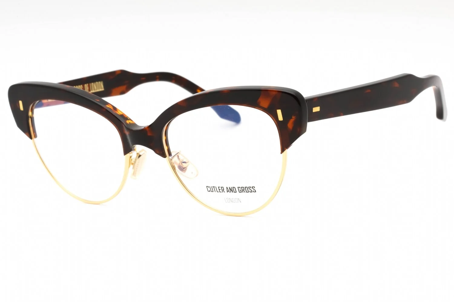 A pair of tortoiseshell and gold-rimmed cat-eye glasses from Cutler and Gross, displayed against a plain white background. The glasses feature a distinctive tortoiseshell acetate frame with gold accents and a gold metal lower rim. The brand name 'CUTLER AND GROSS LONDON' is printed in black on the lower portion of the right lens.