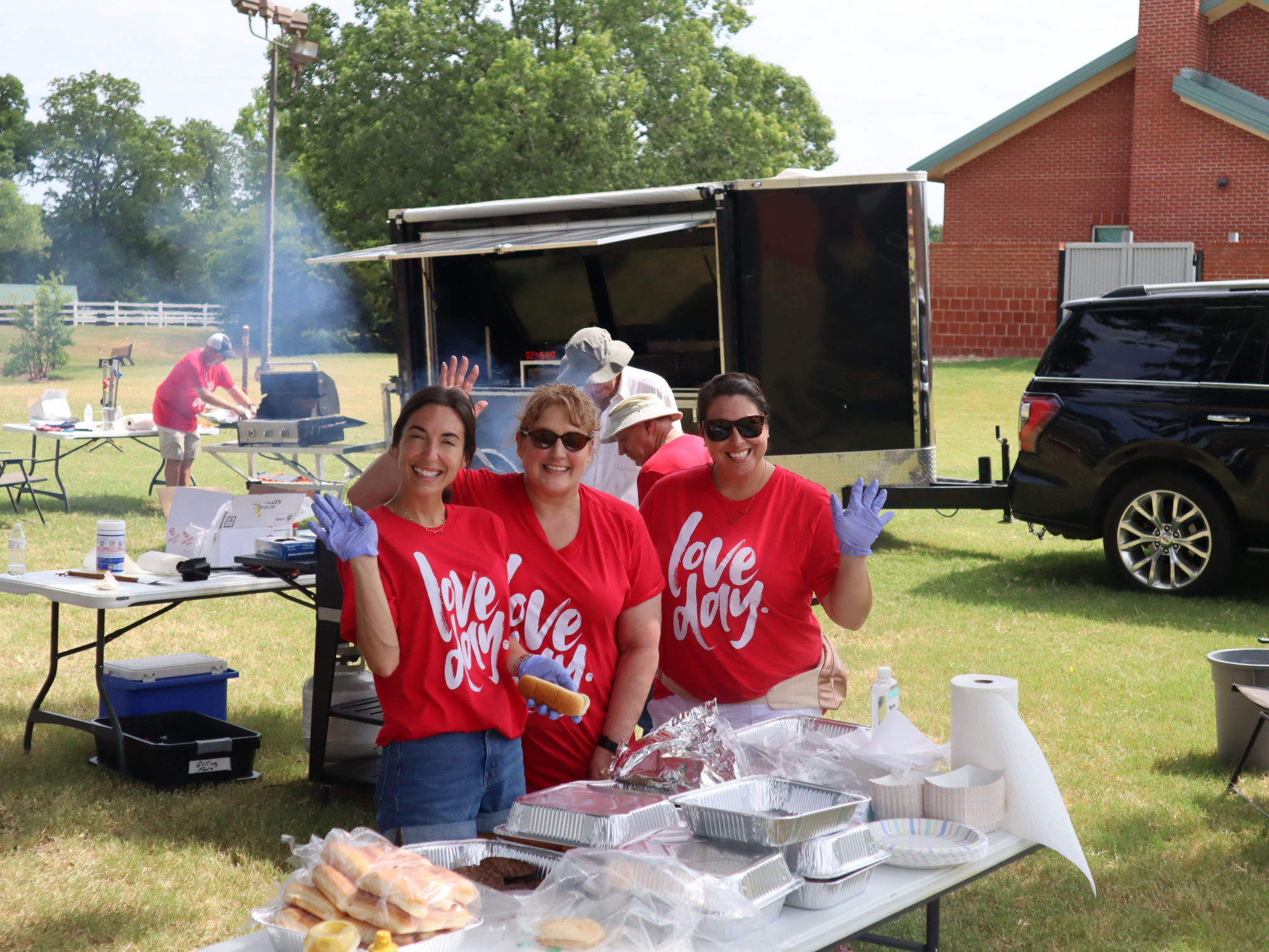 Women serving food at Church on the Move Love Day in Tulsa, Oklahoma