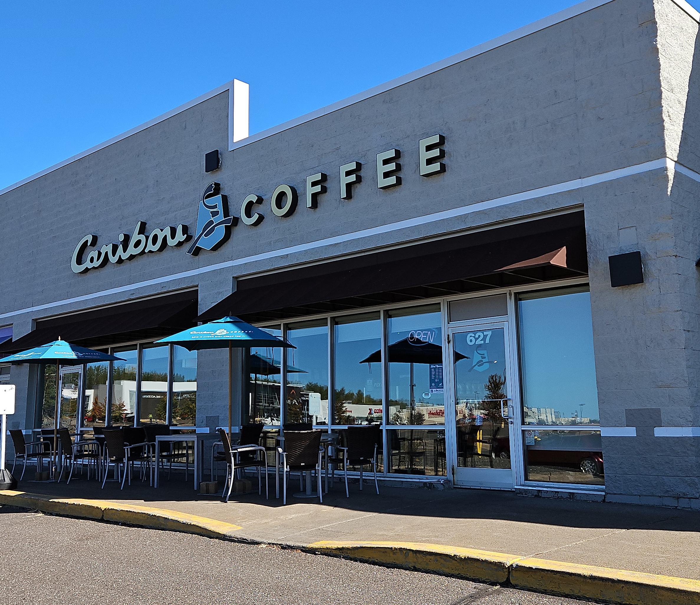 Storefront of the Caribou Coffee at 627 West Central Entrance in Duluth