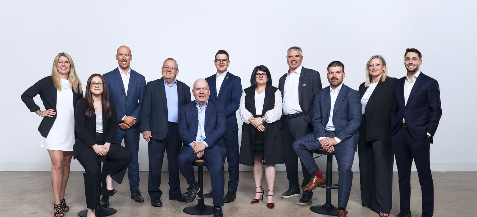A group shot of The Colbert Group.