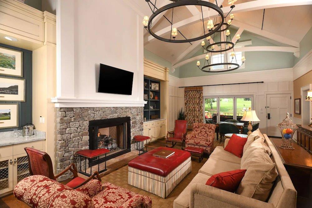 Commercial hospitality renovation completed by Reliant Construction in Colorado Springs, featuring lodge-style interior and custom wood and stone finishes.