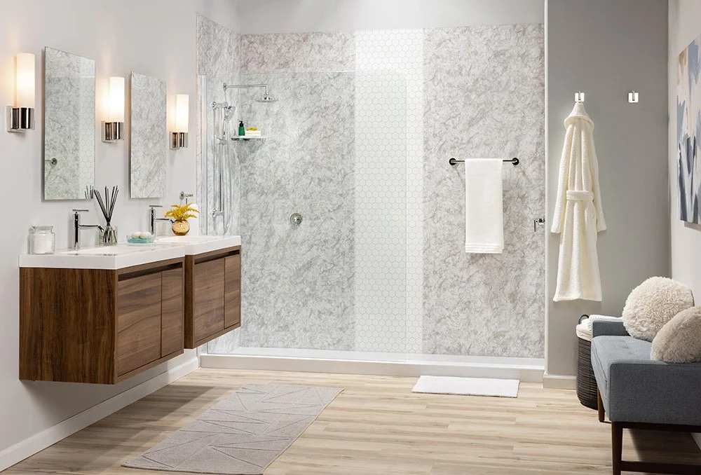 Modern bathroom remodel featuring a custom walk-in shower, double vanity, and wall surround panels,  