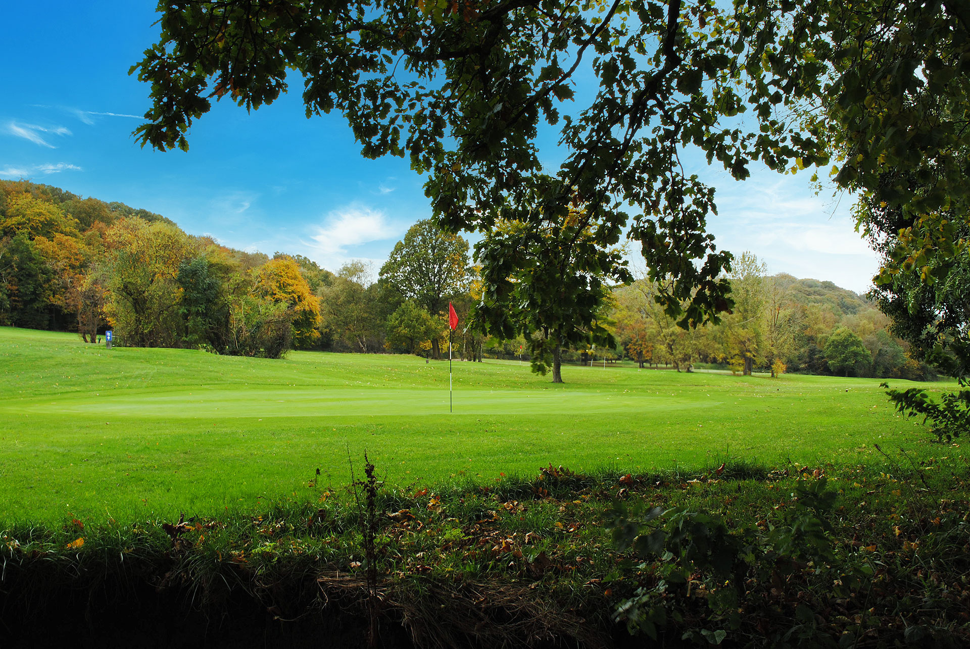 Beauchief Golf Course in Sheffield features tree-lined fairways and rolling parkland set against a scenic countryside backdrop.