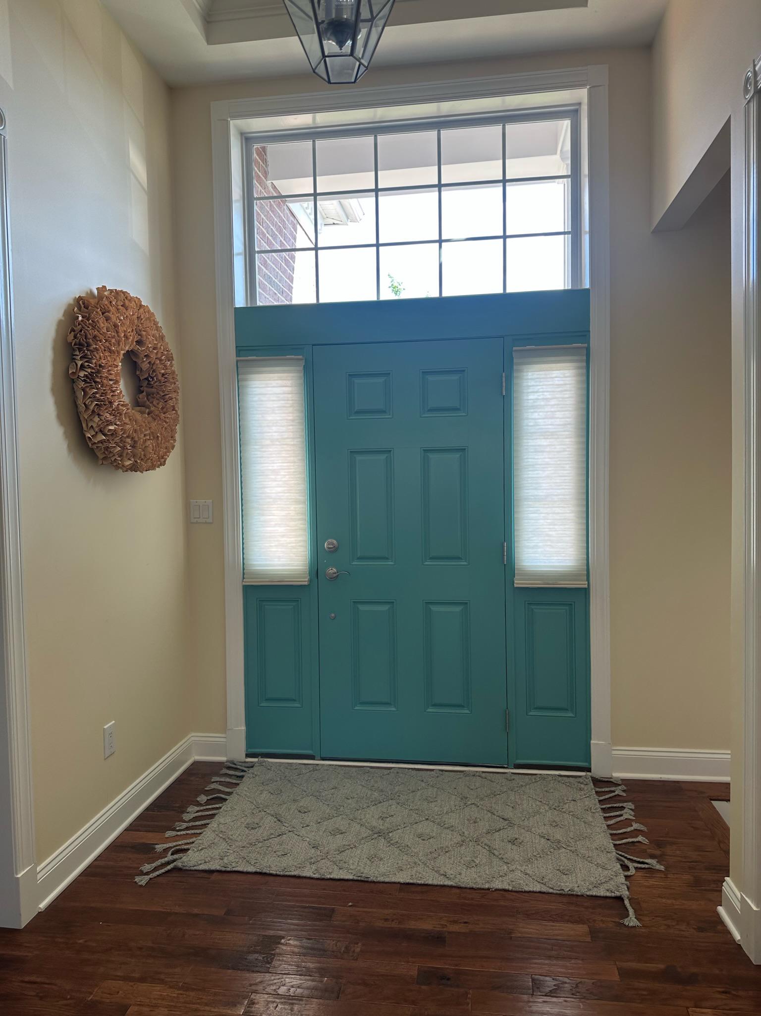 Cellular shades are a great way to add privacy to your entrance door side panels!