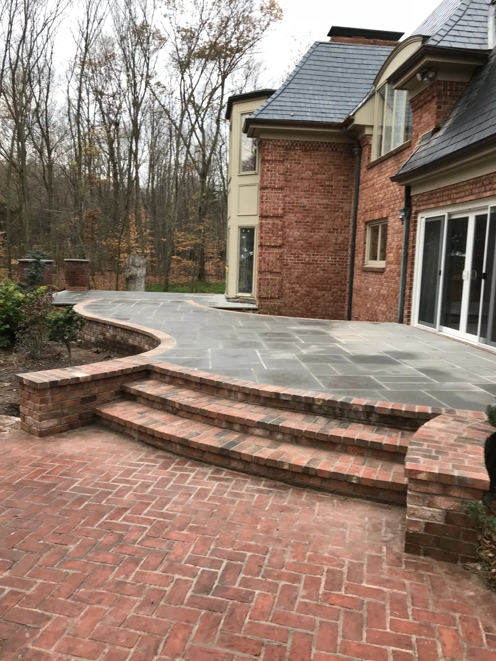 Stone steps with railing - Steps project by General Masonry LLC.