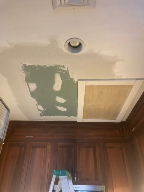 Our handyman from Northfield Handyman travelled to Boston, MA to build a custom access panel for the attic and also patch the ceiling.