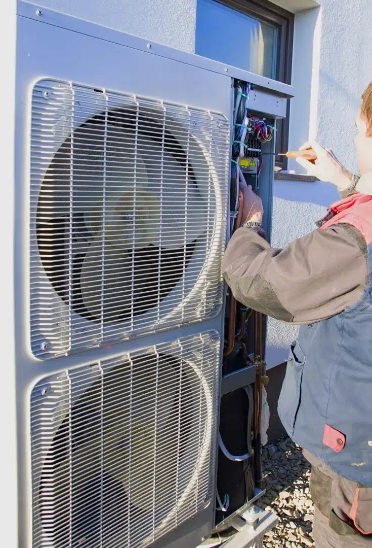 Professional HVAC technician diagnosing and repairing a residential heating system to restore reliable indoor comfort. Expert heating repair services help improve system performance, enhance energy efficiency, and prevent unexpected furnace or heat pump breakdowns during colder months.