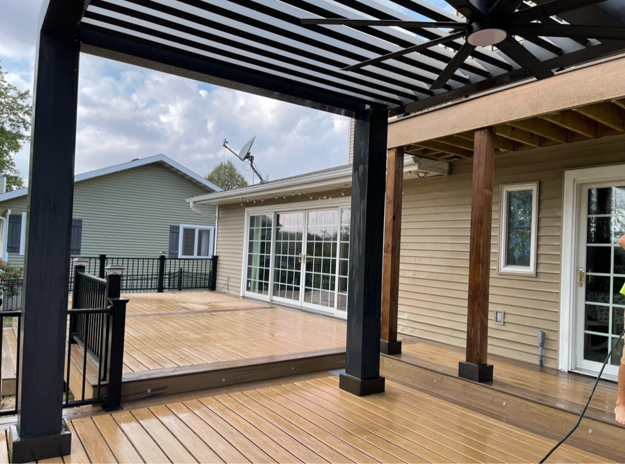 Custom Tanzite Stone Deck with Metal Pergola Cover 