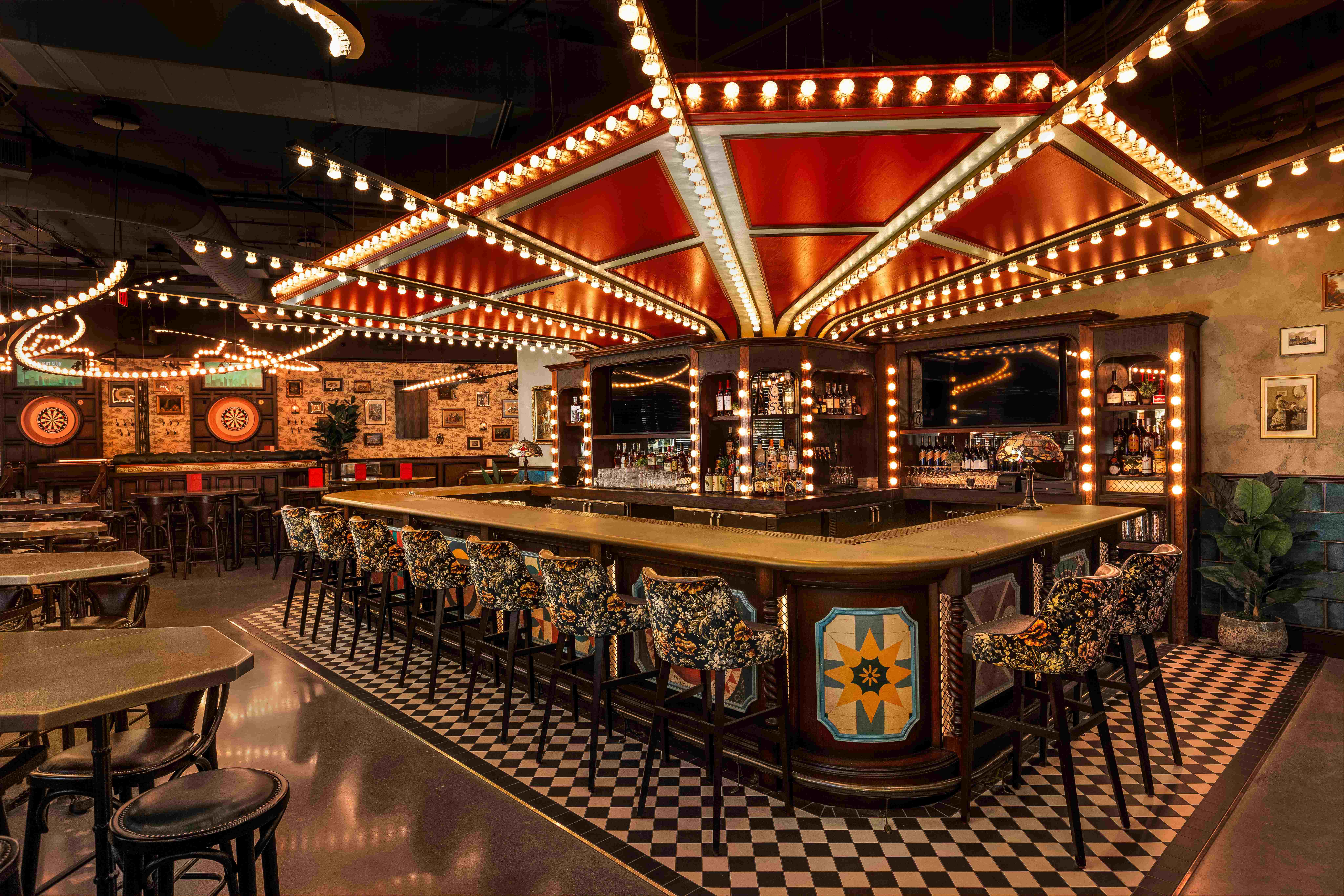 Flight Club is a lively, upscale venue offering high-tech, fast-paced dart games paired with elevated bites, craft beer, and a vibrant social atmosphere.