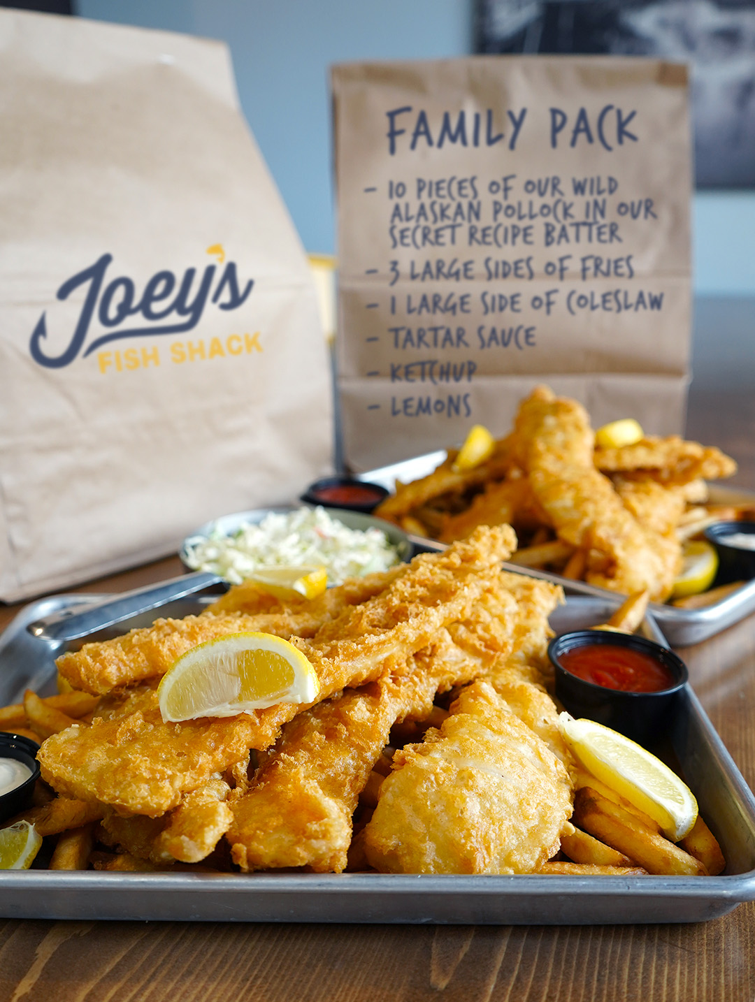FAMILY PACK - 10 pieces of Wild Alaska Pollock battered in our secret recipe batter, three sides of  Joey's Fish Shack Camrose (780)673-0164