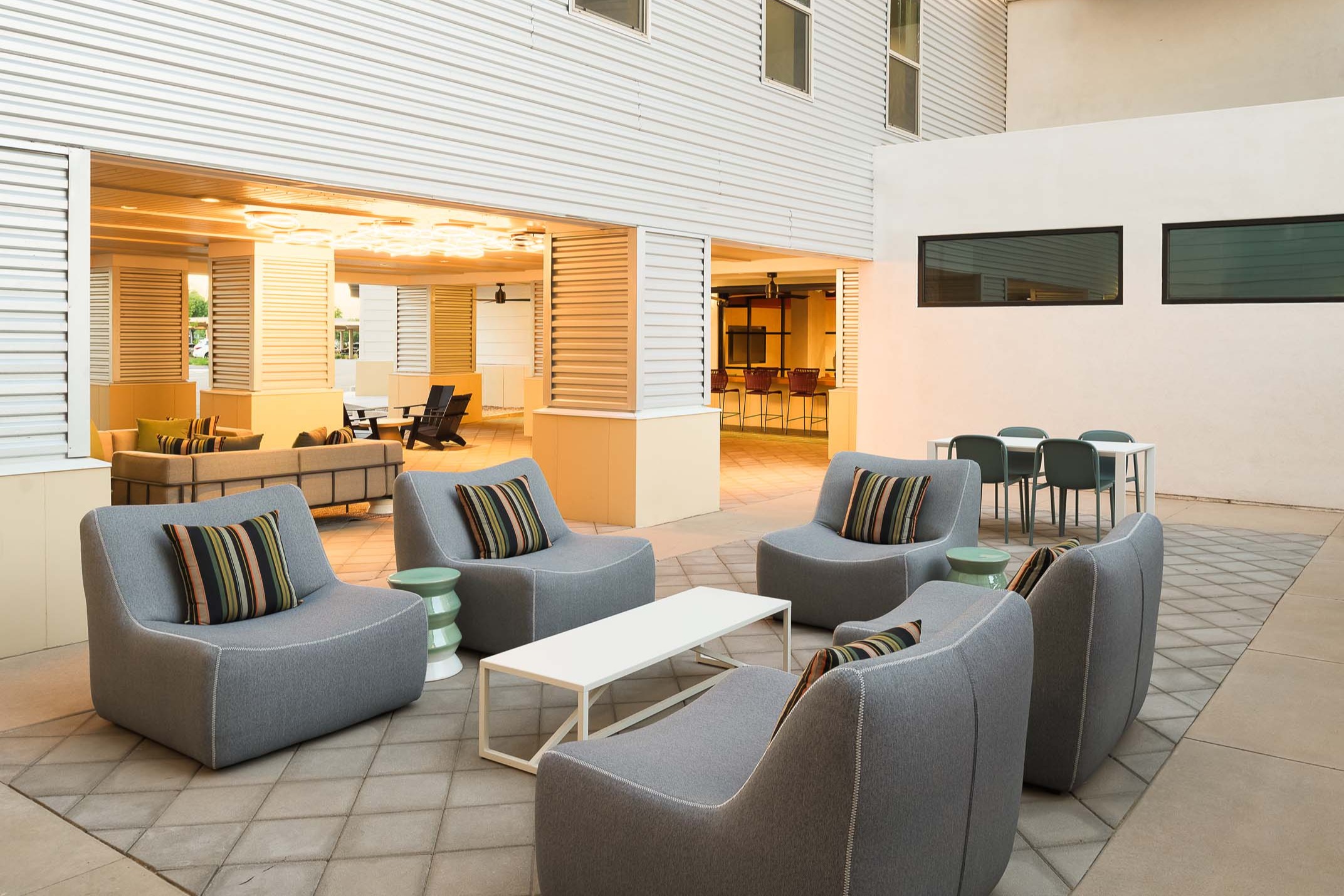 Outdoor courtyard with covered paseo lounge at Camden Gilbert apartment homes in Gilbert, AZ