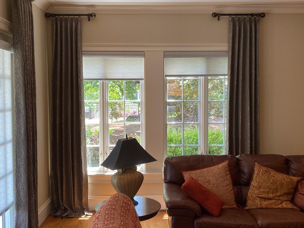 Frame your living room with the grace of flowing drapes ️✨. They're not just window coverings; they' Budget Blinds of Knoxville & Maryville Knoxville (865)588-3377