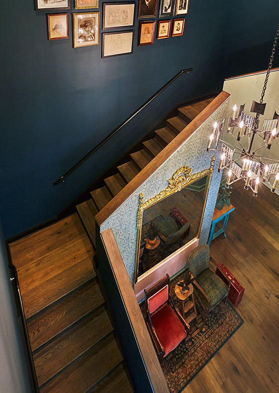 Take these stairs up to the game room (and bar!)