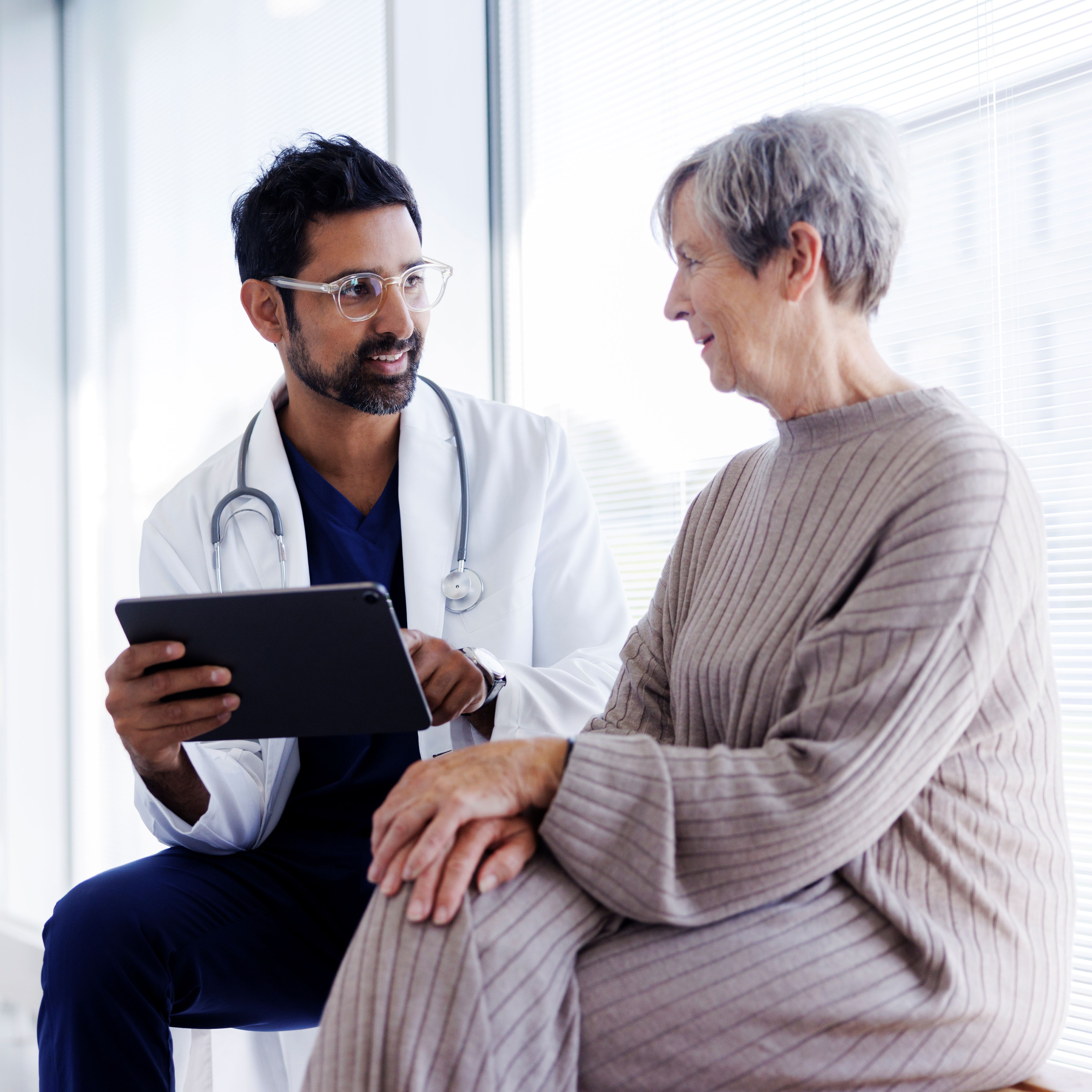 A doctor talking to a patient about Dialysis maintenance