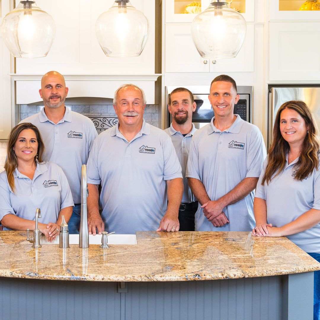 Senior leadership and core field team of Fiderio & Sons pictured in a finished kitchen project.