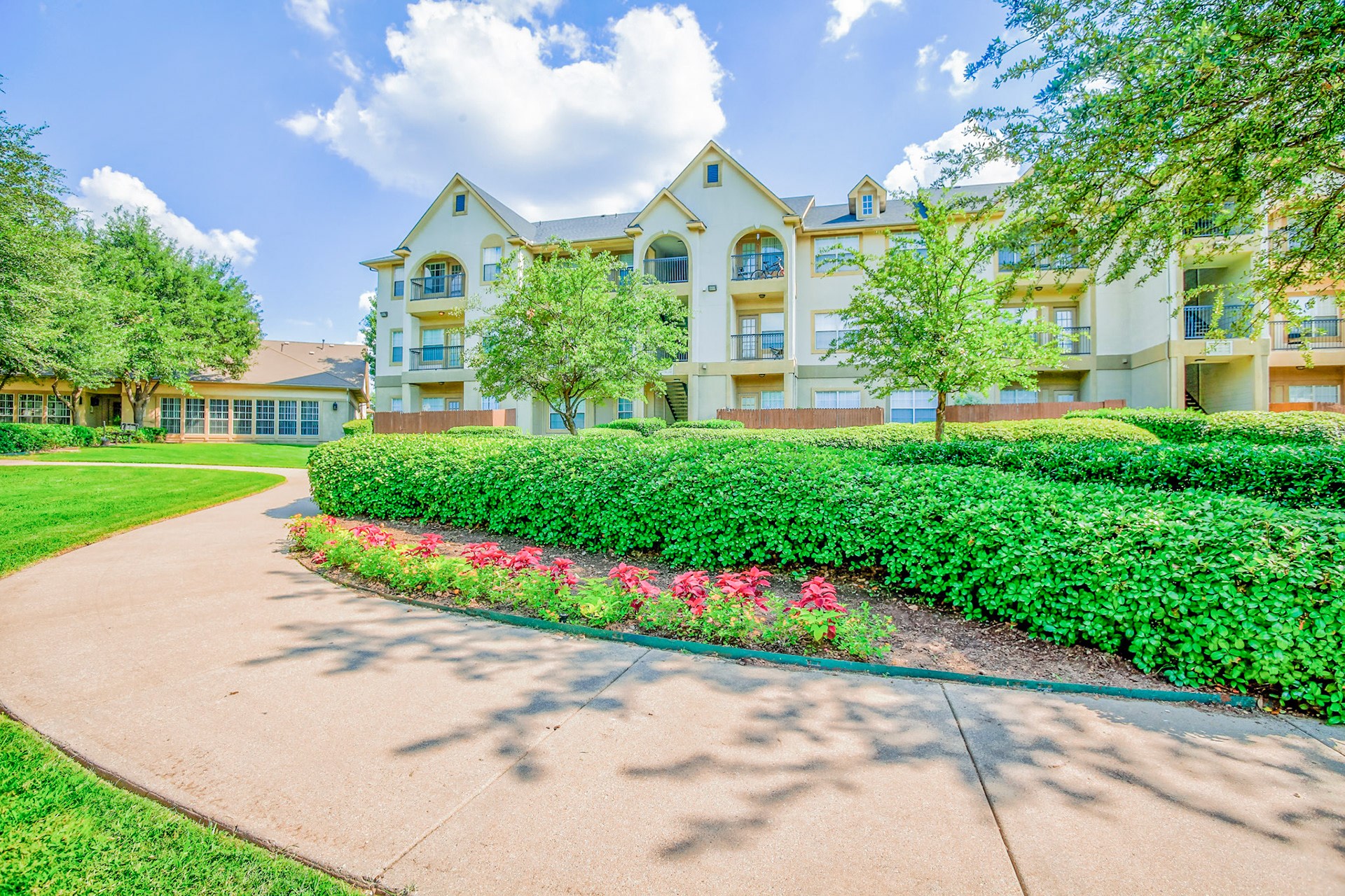 Lush landscaping with walkway