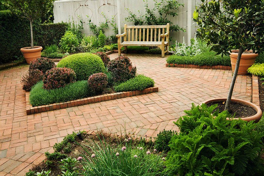 K & R Landscaping provides paver patios and plants.