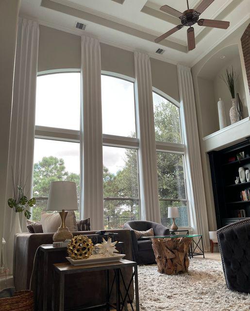 Draw attention to the most elegant parts of your home. These show-stopping, two-story Draperies are certain to wow every guest who visits this Katy, TX, home. #BudgetBlindsKatySugarLand #KatyTX #CustomDraperies #DrapedInBeauty #FreeConsultation #WindowWednesday