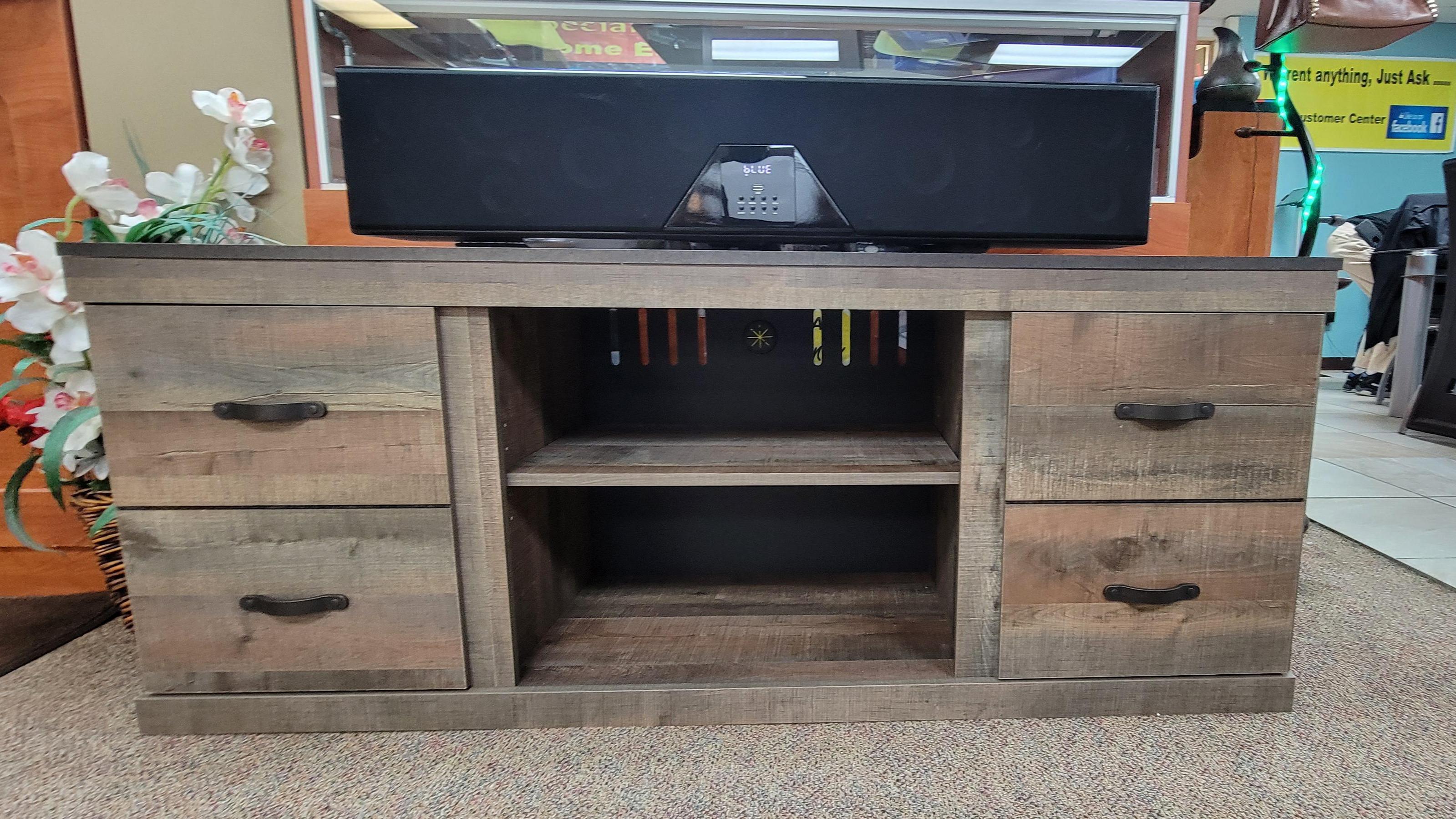 Tv stand and wall mount sound bar. Perfect for the guest room.