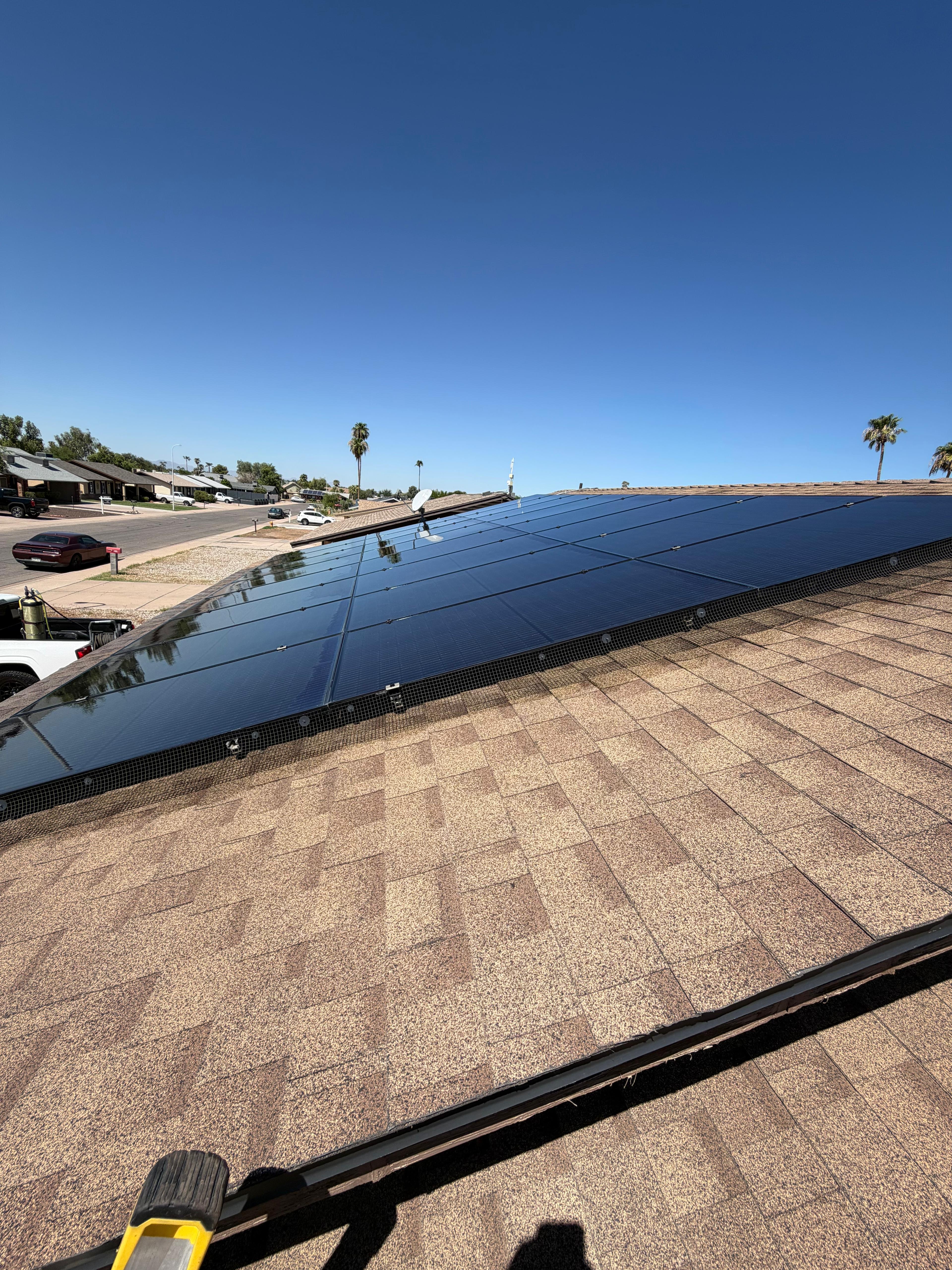 Clean residential rooftop solar array serviced by SunWorx Solar Services as part of ongoing professional solar panel care in Arizona.