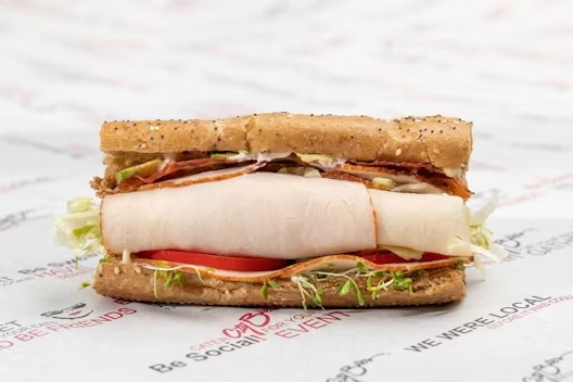 Turkey breast, bacon, provolone, avocado, alfalfa sprouts, lettuce, tomatoes, mayo, blended oils, salt & pepper.