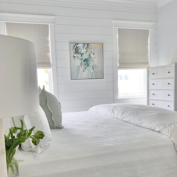 A simple white design offers clean and inviting vibes, but too much light can make them look overly bright. With enhanced light-filtering and room-darkening features, Roman shades can offer superior light control while maintaining the view outside when raised.