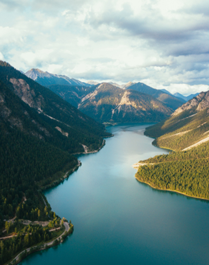 A serene lake surrounded by mountains.