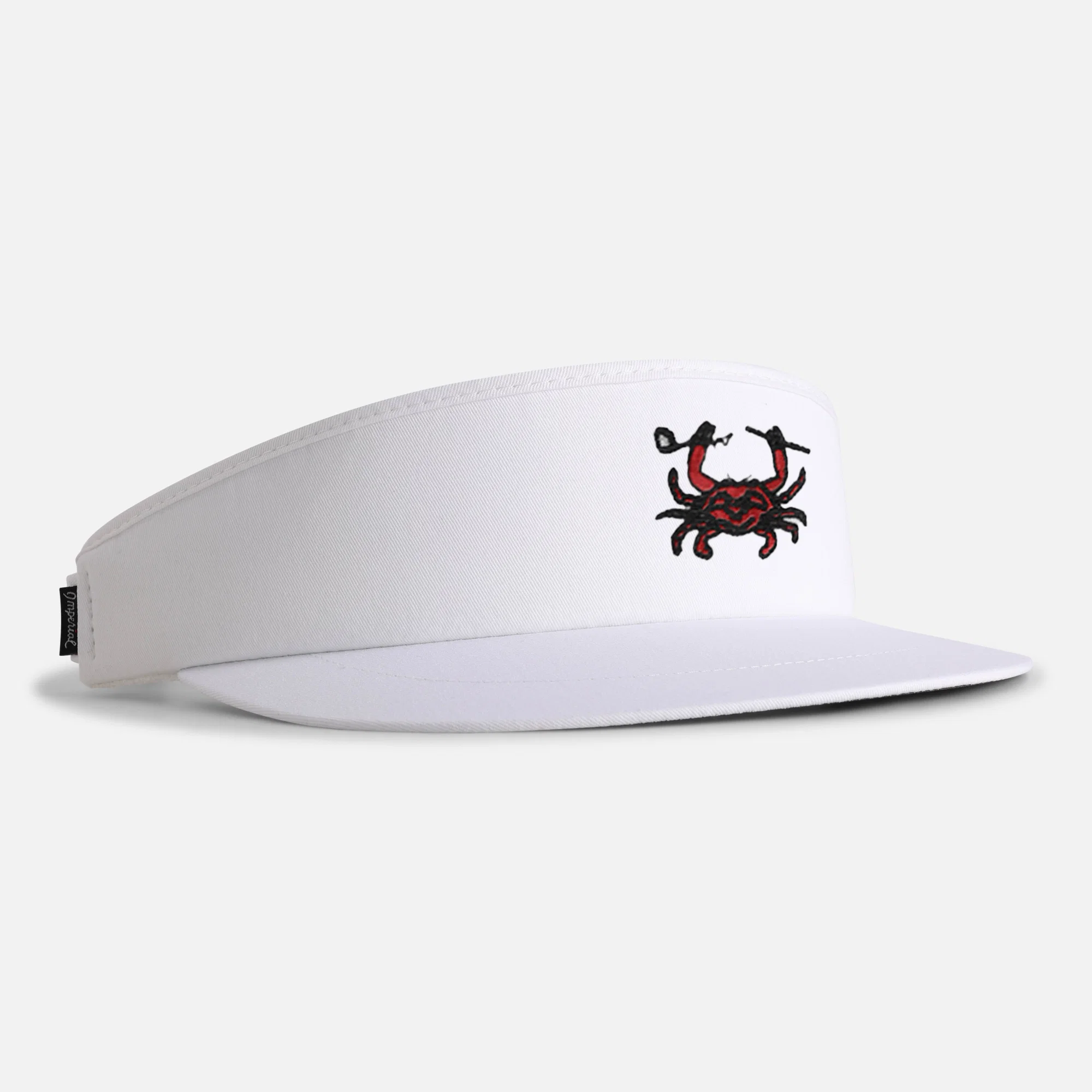 Tour Visor&reg; in white with a club-wielding crab - one of the coastal designs in the collection.