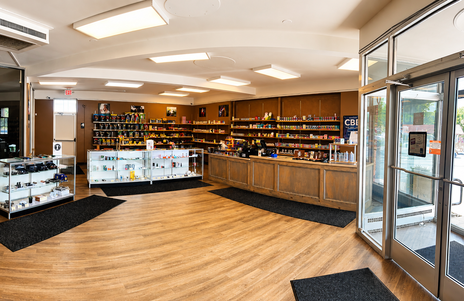 A wide-angle view of the CigarBox Tamaqua retail showroom showcases a clean, spacious interior with premium cigars, tobacco products, vaping supplies, and cigar accessories. The bright, organized layout and welcoming atmosphere make it easy for customers to browse quality products in Tamaqua, Pennsylvania.