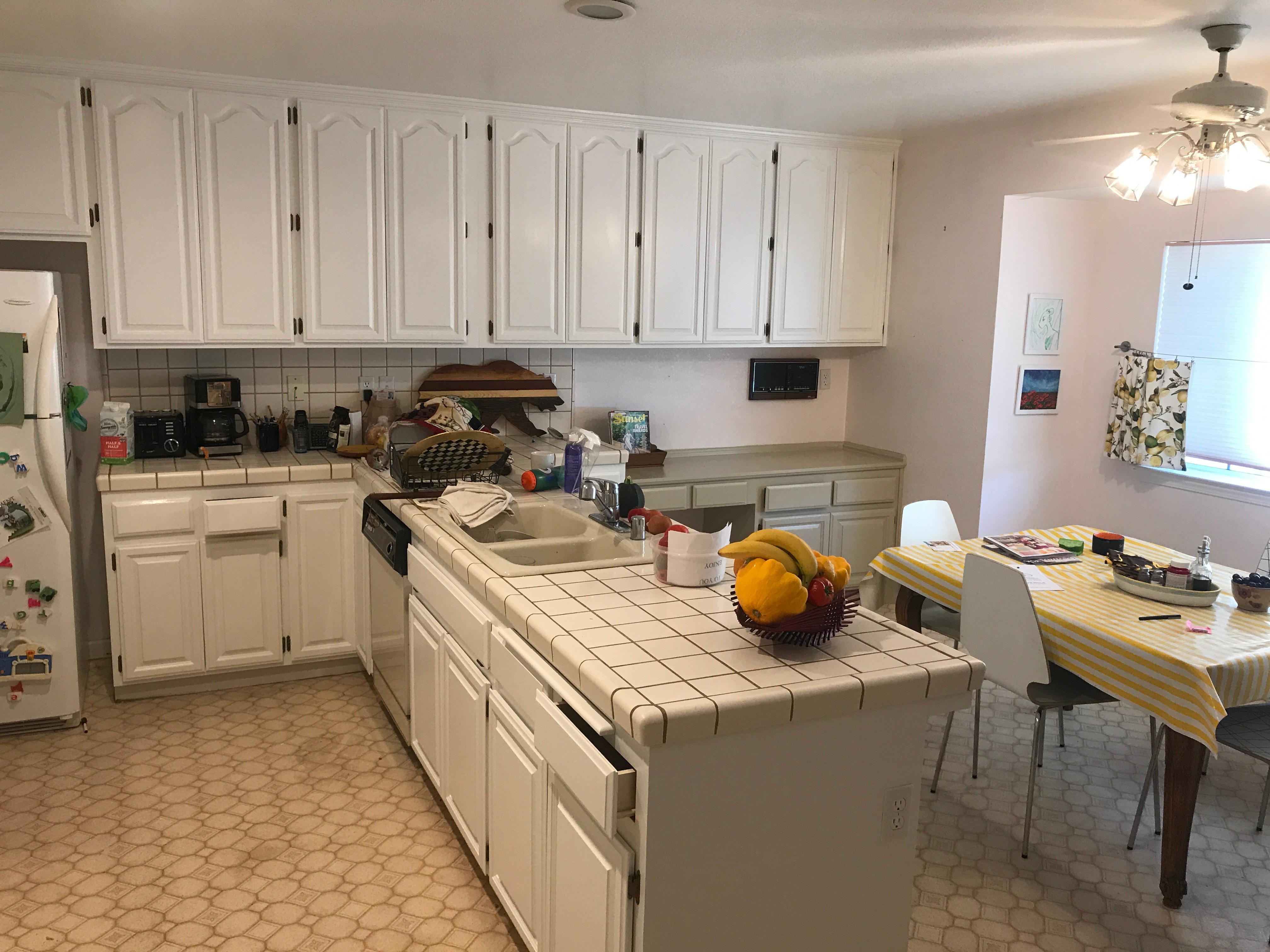 From stain grade dated cabinets to new fresh paint and new hardware