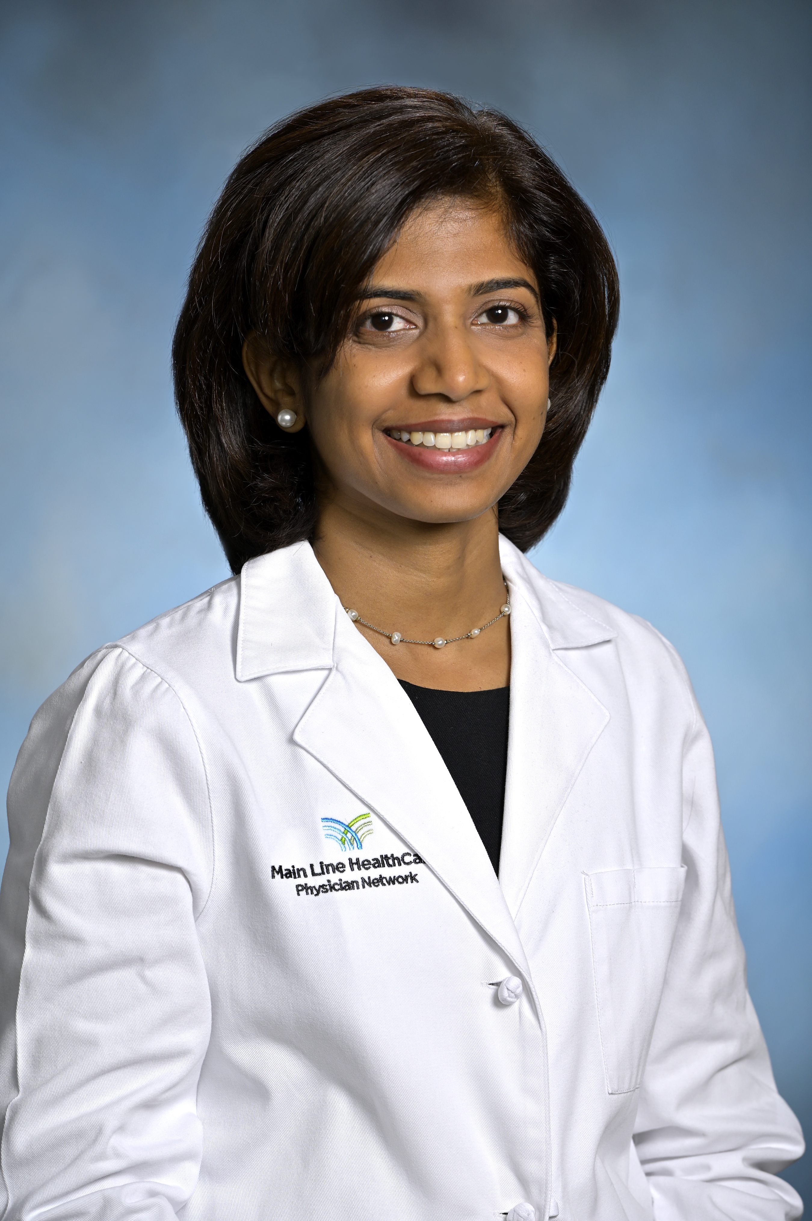 Headshot of Anitha Somasundaram, MD