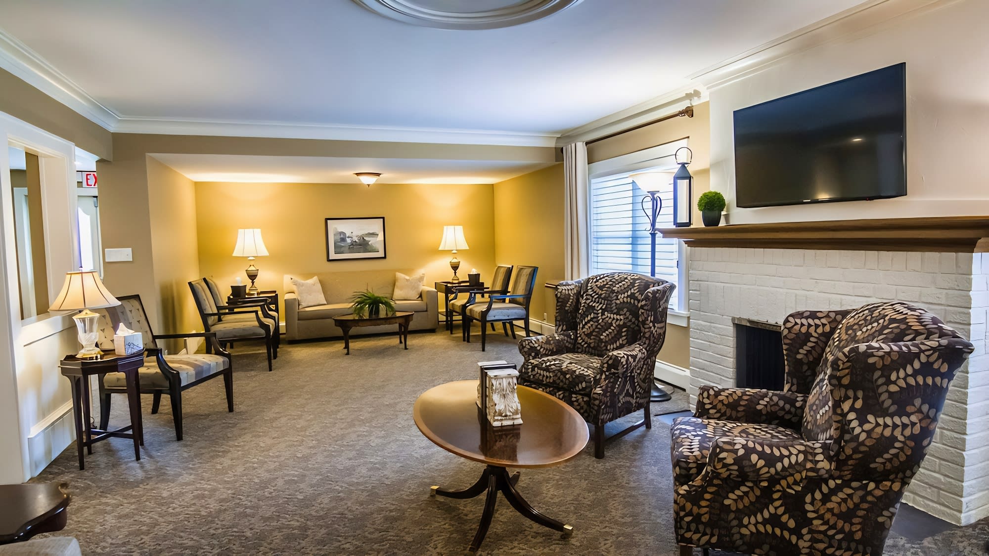 Our fireplace lounge, a quiet place for family to gather before and after a service.
