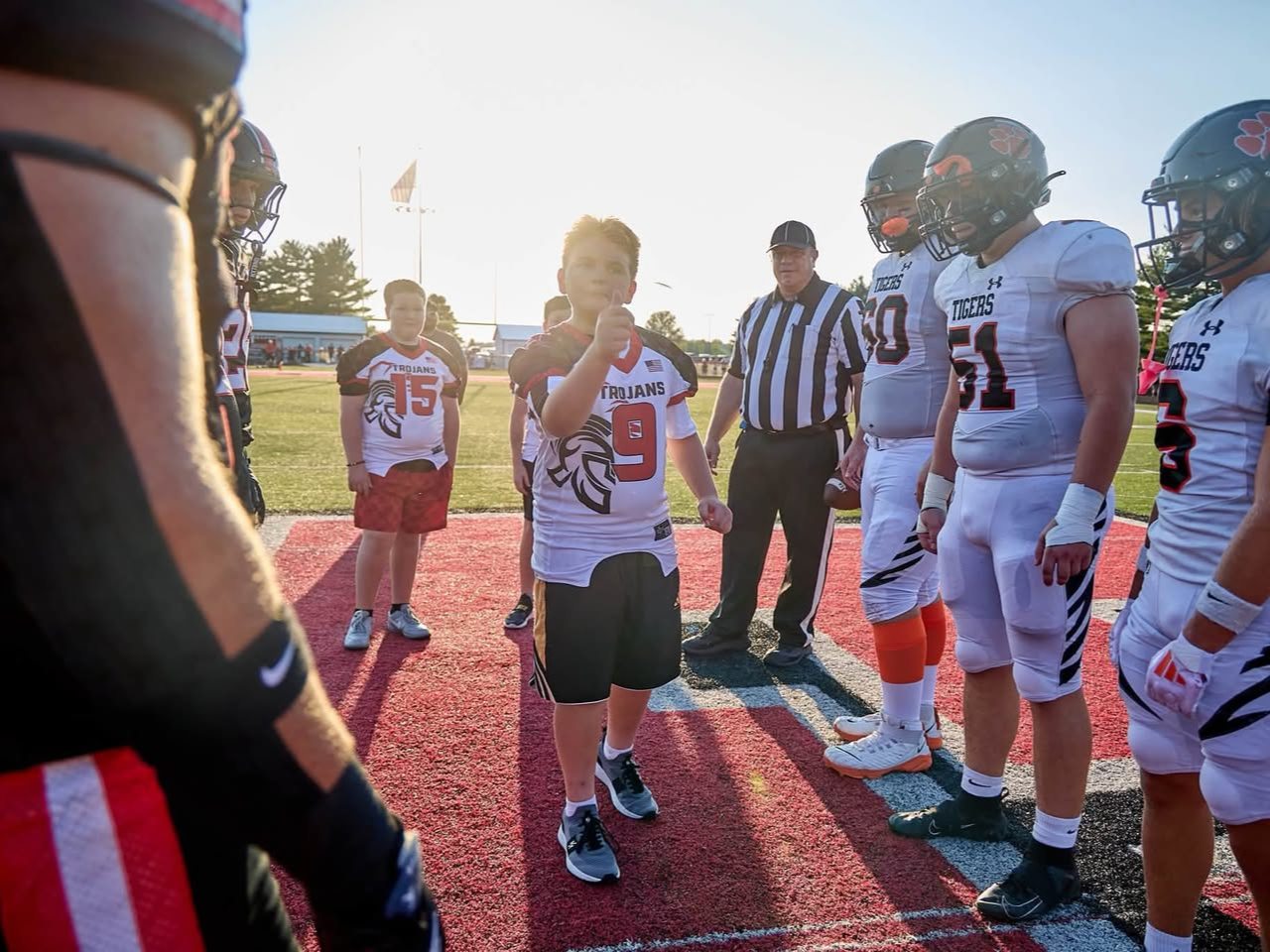 Each year, I sponsor the game ball for East Central High School home football games and get to share the experience with three Pee Wee players. Seeing their excitement makes it even more memorable. Thank you, Sandy Mahoney, for the photos!