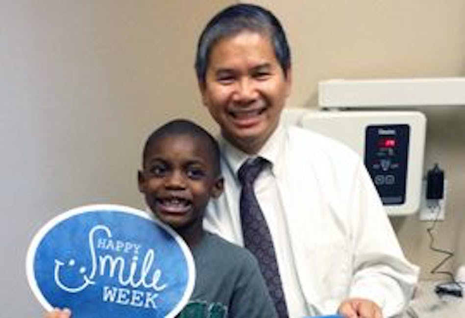 Dr. Henry Phan and patient at Fine Dentistry | Chandler, AZ