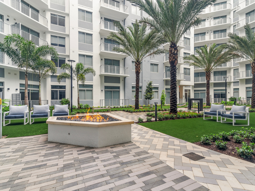 Outdoor Fireside Seating at The Marc Luxury Apartments in Palm Beach Gardens FL